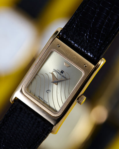 Vintage Universal Geneve Gold Tone Rectangular Dress Watch Wave Dial Swiss Made