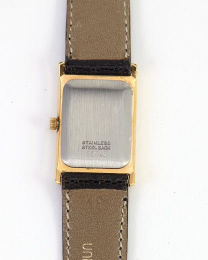 Vintage Universal Geneve Gold Tone Rectangular Dress Watch Wave Dial Swiss Made